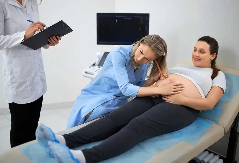 medium shot smiley doctor explaining ultrasounds